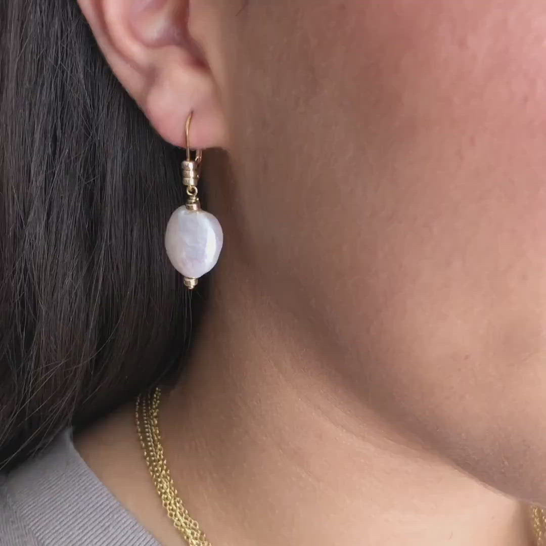 strut jewelry pearl medallion dangle earrings
