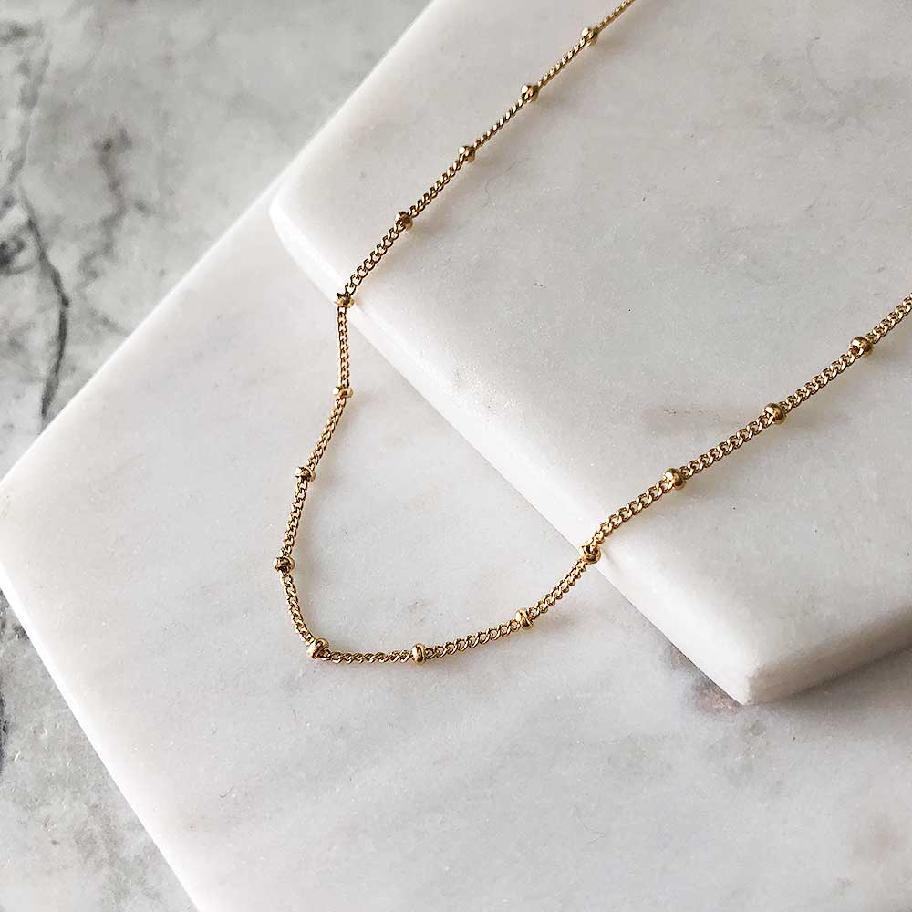 strut jewelry beaded curb chain gold fill