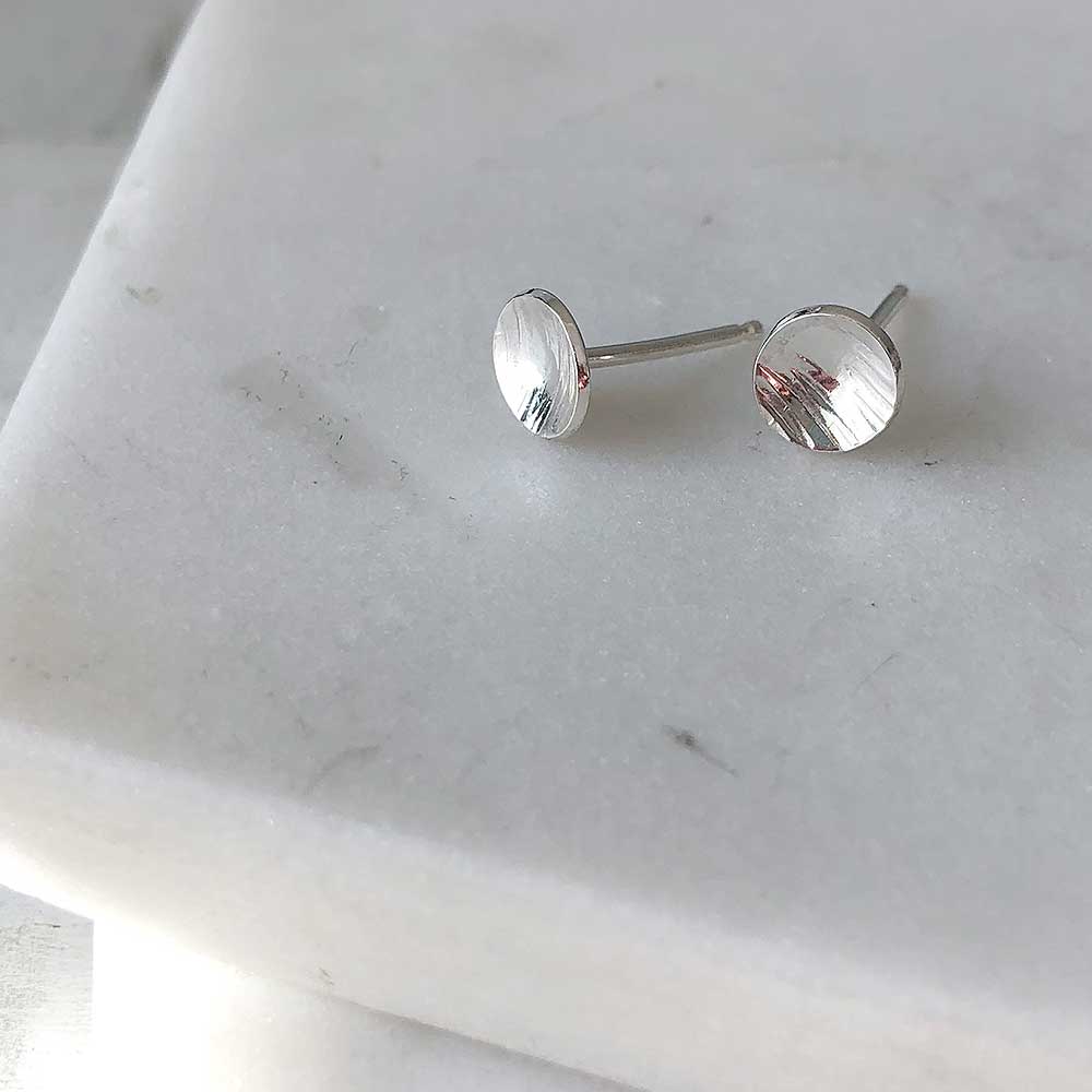 strut jewelry textured dot stud earrings