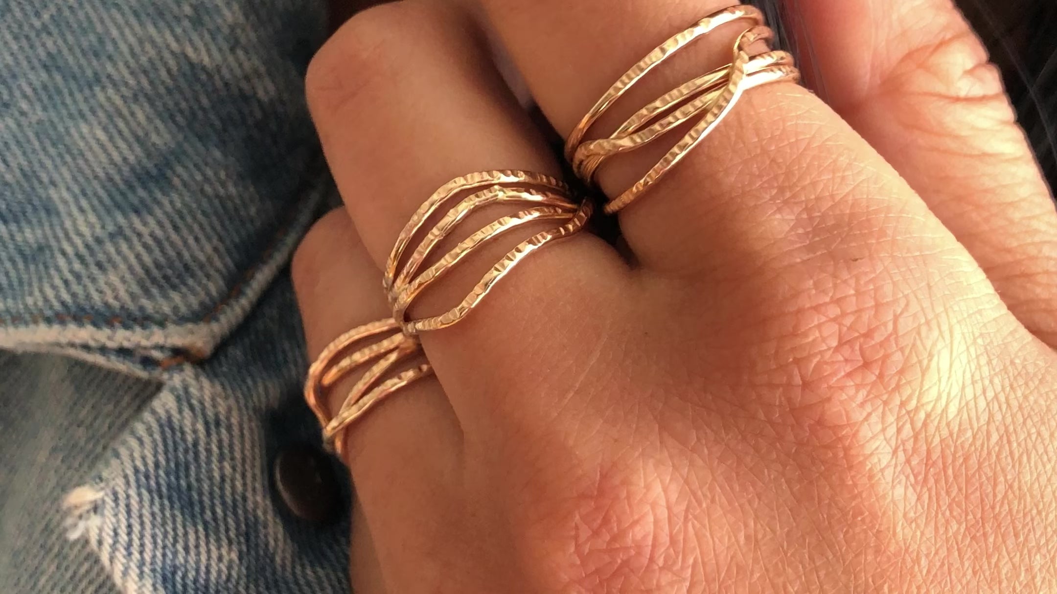 Load video: gold wire multi-textured ring on a hand
