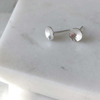 strut jewelry textured dot stud earrings