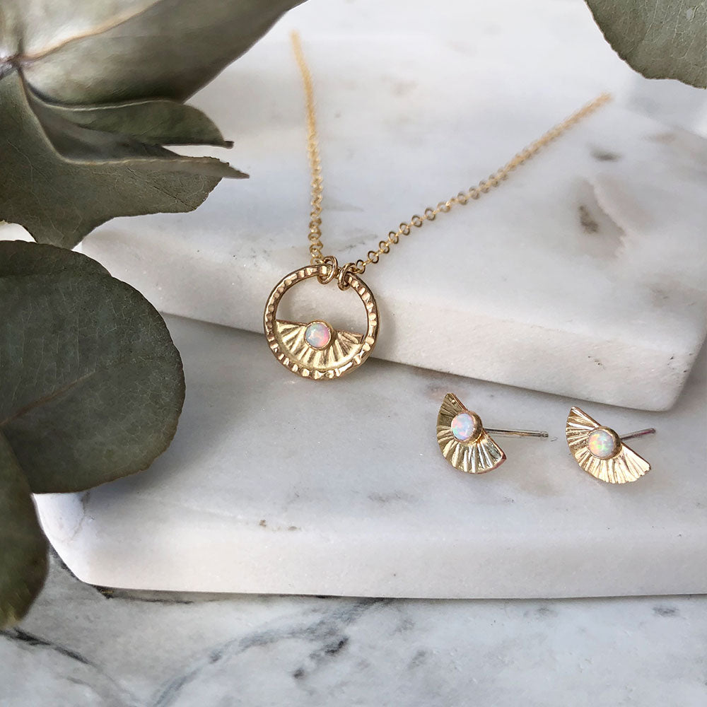 strut jewelry opal sunburst earrings and necklace