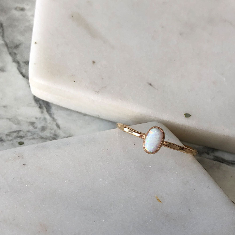 strut jewelry oval opal ring